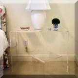 F36. Crate & Barrel Peekaboo acrylic console table and stool. 29”h x 38”w x 13”d 